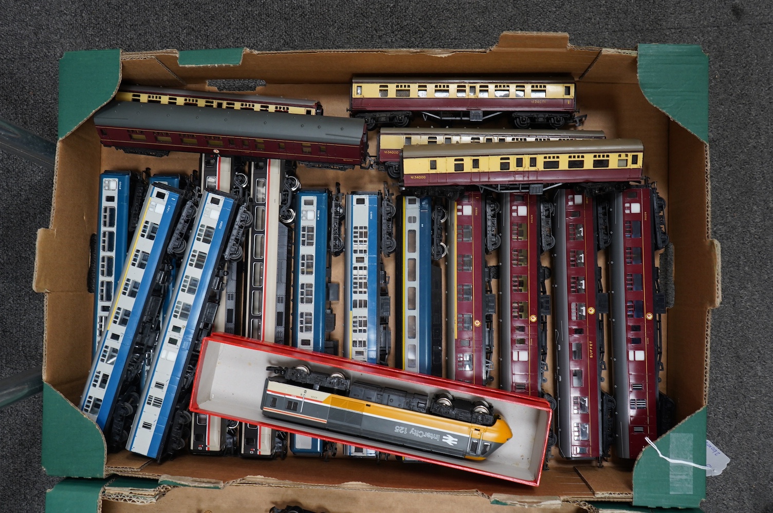 A collection of 00 gauge railway by Hornby, Tri-ang, etc. including; sixteen locomotives (a.f.), many for restoration, together with eighteen bogie coaches including; InterCity, LMS, and BR(MR). Condition - poor to good.